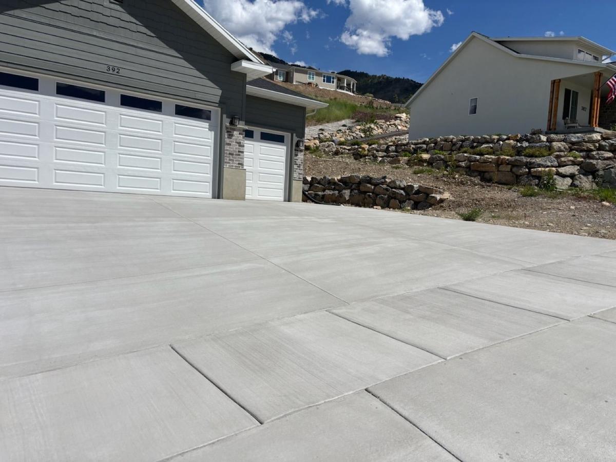 A driveway sealed by Alta Vista Construction