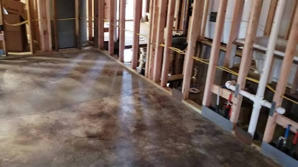 Basement floor being stained